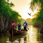 A young woman and a bald man exploring the Sundarbans by boat