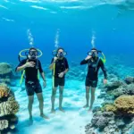 Tourists enjoying the Belize Barrier Reef