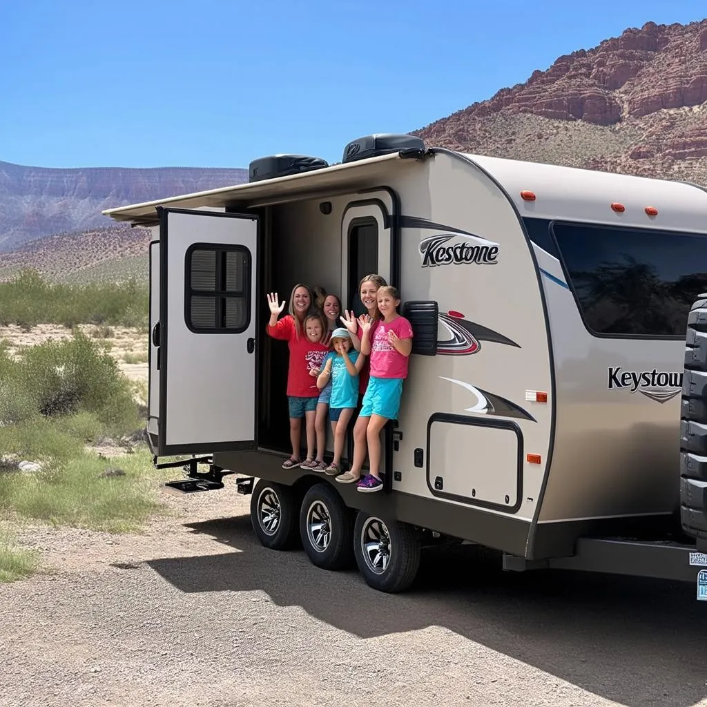 A family embarks on a road trip in their Keystone Hideout travel trailer.