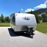 A-liner trailer parked in the mountains with a stunning view