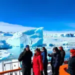 Tourists on an expedition ship in Antarctica