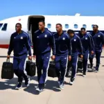 Basketball team boarding a private plane