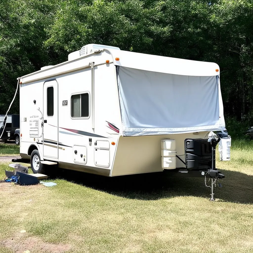 Travel Trailer Parked at Campsite