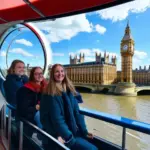 Tourists enjoy the view from a London Eye capsule