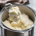 Insulated container with mashed potatoes