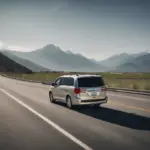 Minivan driving on an open road