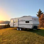 Oliver Travel Trailer parked at a scenic campsite