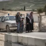 Palestinian Family at Checkpoint