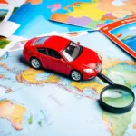 Toy car exploring a world map