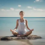 Woman meditating by the sea