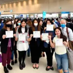 Travelers with vaccination certificates at the airport