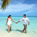 Couple Enjoying Beach at AM Resorts