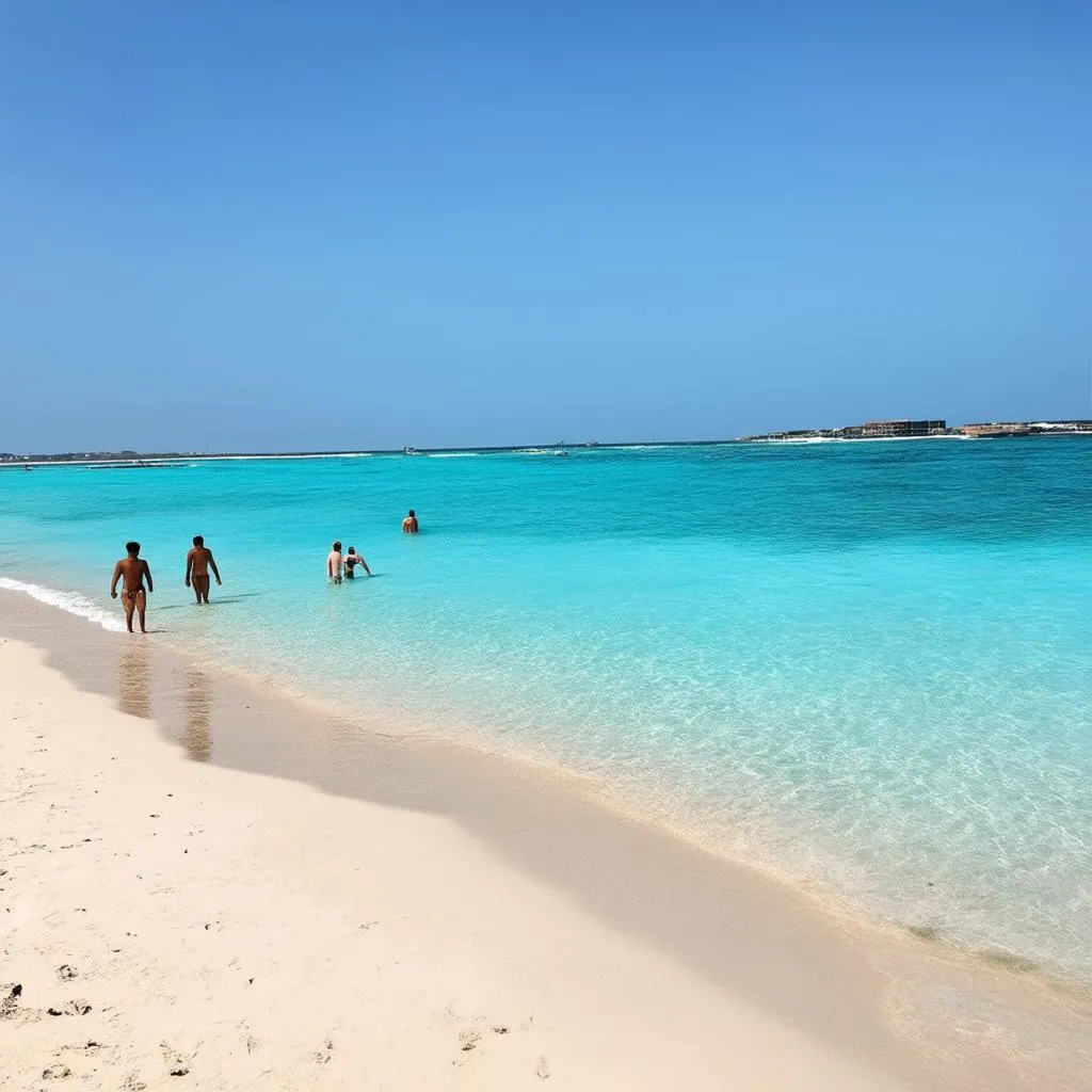 A serene beach with few people during off-season