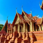 Ancient Thai temples bathed in sunshine