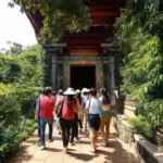 Vietnamese tour group exploring ancient temple