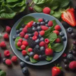 Plate of berries and leafy greens