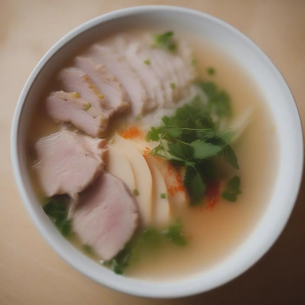 Steaming bowl of Au Tau porridge