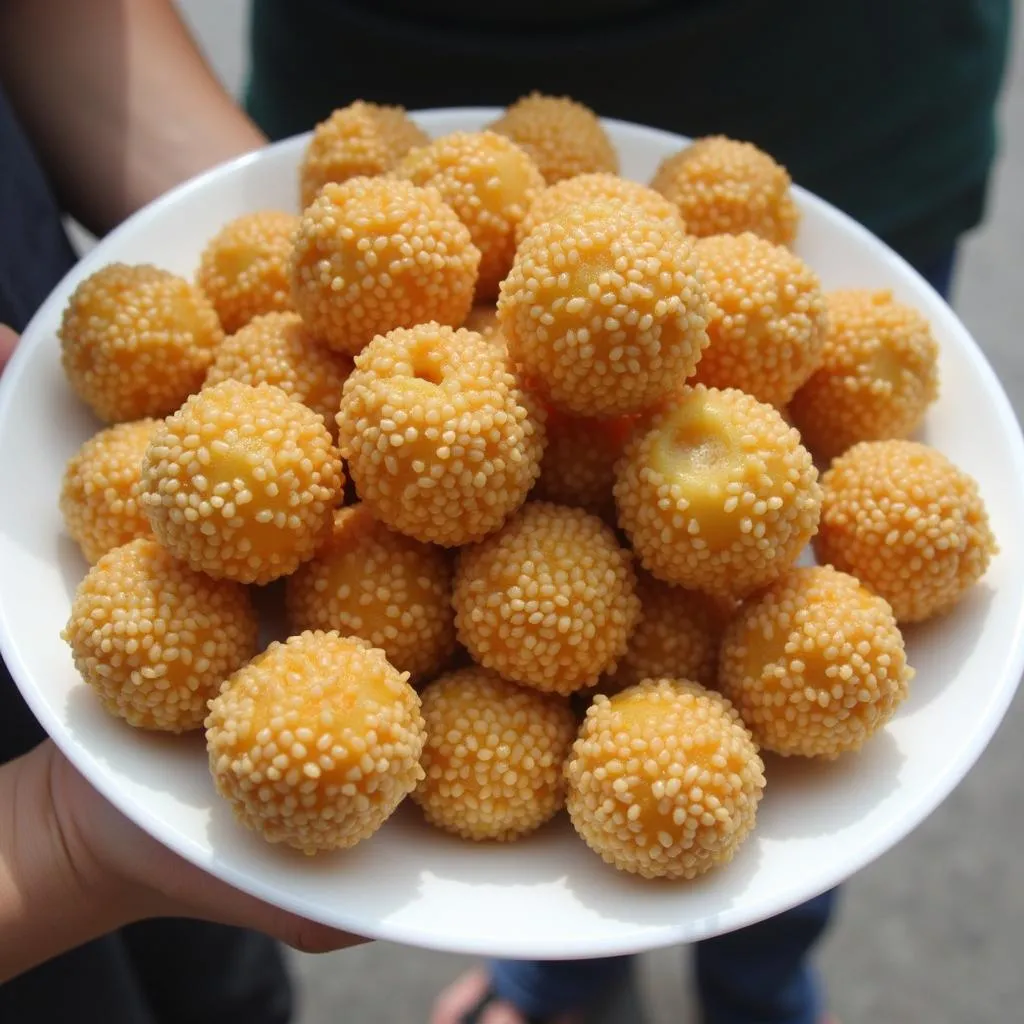 Plate of banh cam sesame balls