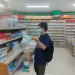 Buying face masks at a pharmacy in Binh Duong