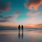 Couple enjoying sunset on a tropical beach