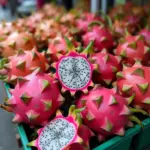 Dragon fruit varieties on display at a Hanoi market