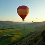 Hot air balloon ride over scenic landscape