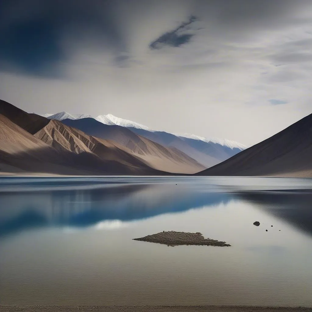 Ladakh, India - Serene Pangong Tso lake and mountains