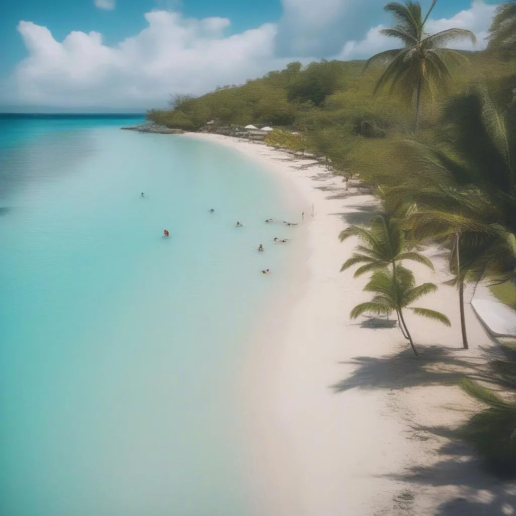 Tourists relaxing on Montego Bay beach