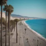 Tourists strolling along the Promenade des Anglais