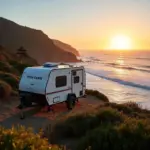 Open Range travel trailer parked on Pacific Coast Highway