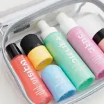 Travel-sized toiletries in a clear bag