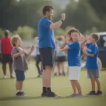 Family volunteering at youth soccer game