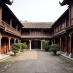 Traditional Hanoi communal house with intricate wooden carvings