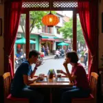 Tourists using wifi in a Hanoi cafe