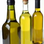 Olive oil, canola oil, and flaxseed oil in bottles