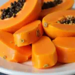 Sliced ripe papaya on a plate