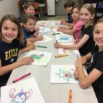 Children engaging in drawing activities