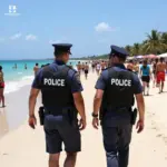 Police officers patrolling Tulum beach on foot