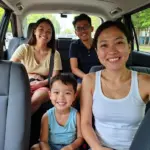 Family traveling in Hanoi in a TRAVELCAR vehicle