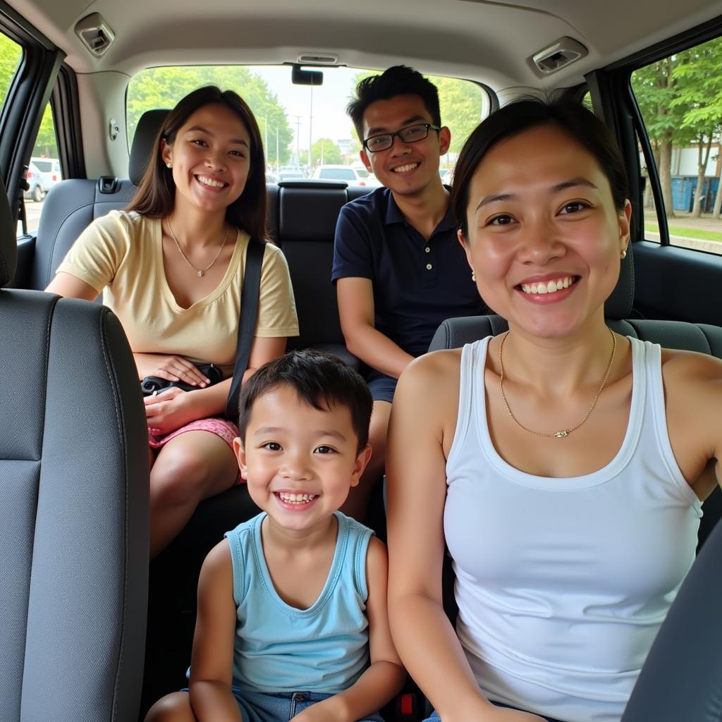 Family traveling in Hanoi in a TRAVELCAR vehicle