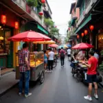 Hanoi Old Quarter street food scene with vendors and tourists