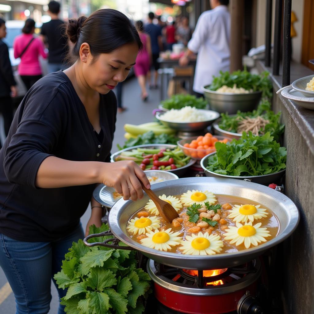 Hanoi street food vendor preparing dien dien flower dishes.