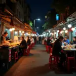 Hanoi street food dinner scene with various vendors and diners.