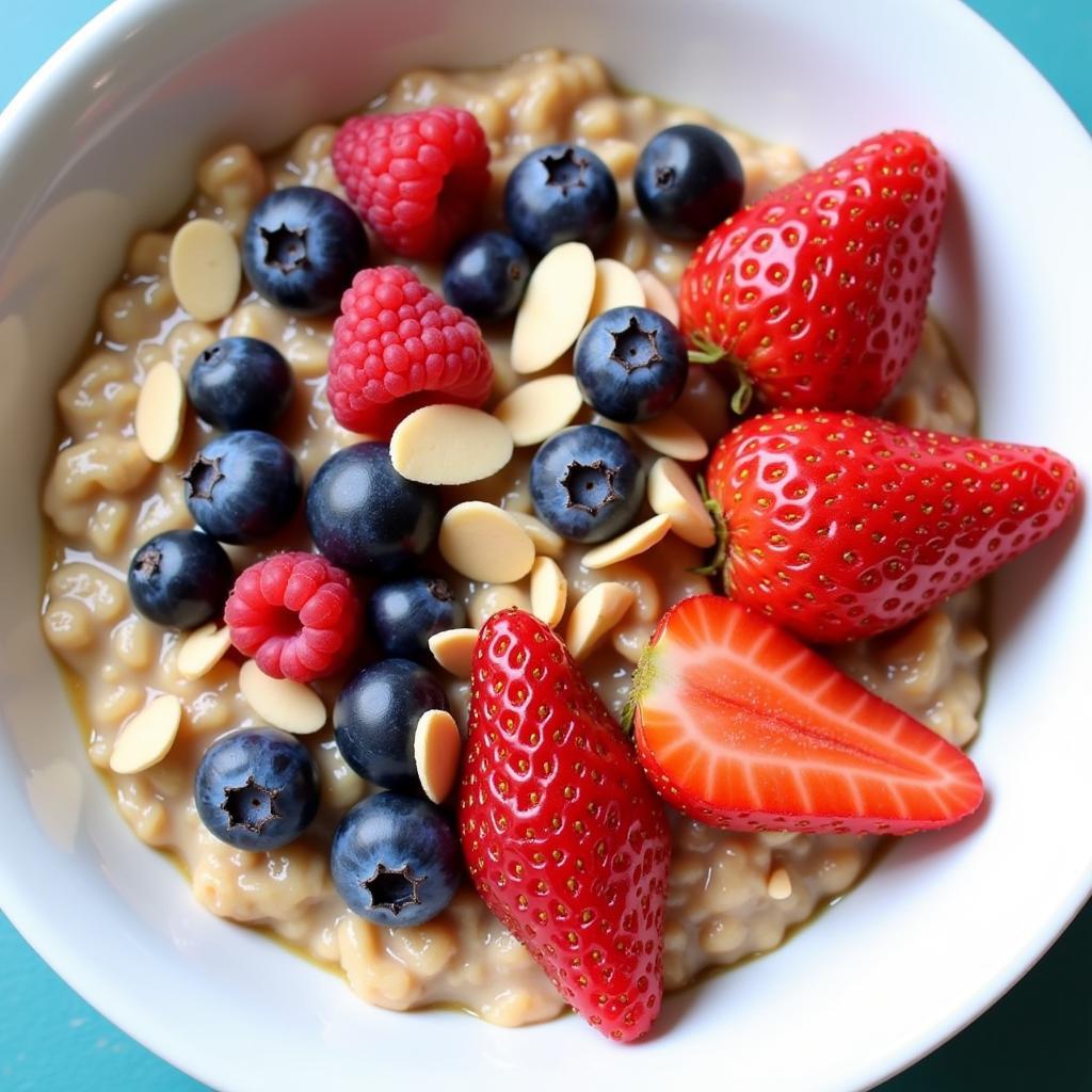 Oatmeal topped with fresh berries and a sprinkle of chopped nuts