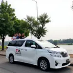 TRAVELCAR vehicles providing transportation services for a West Lake food tour in Hanoi.